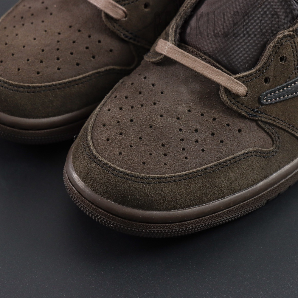 Travis Scott x Air Jordan 1 Low OG SP Velvet Brown — close-up of suede toebox texture.