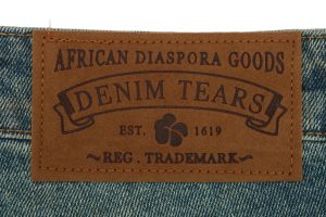 Denim Tears logo tag
