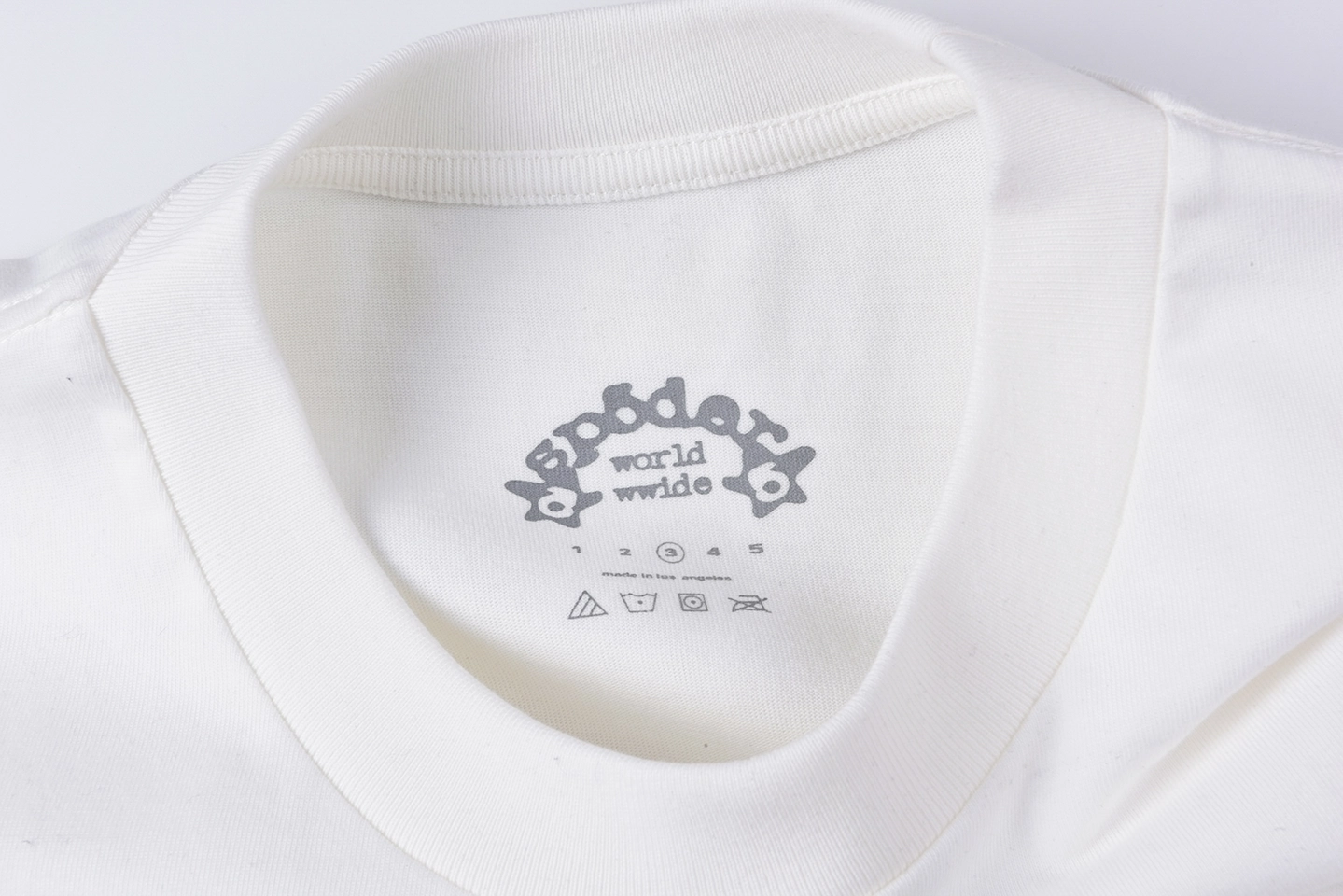 Sp5der “Star Oval Logo” Graphic T-shirt2