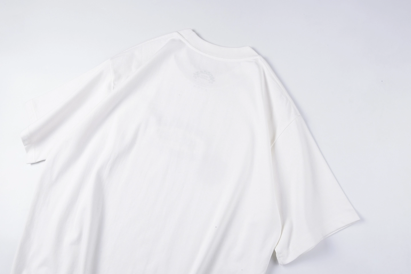 Sp5der “Star Oval Logo” Graphic T-shirt5