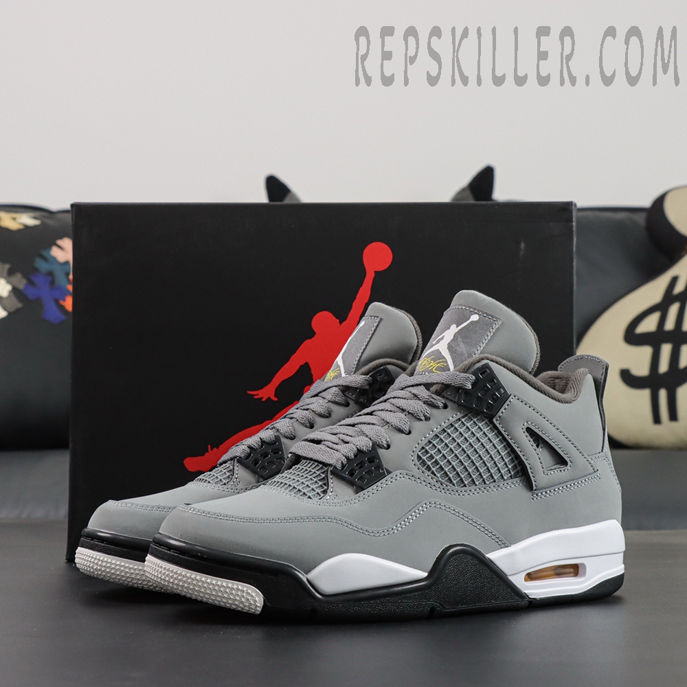 Air Jordan 4 Retro ‘Cool Grey’ 2019 displayed in front of Jumpman logo box
