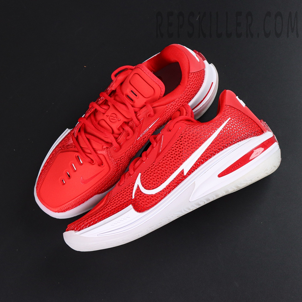 Air Zoom GT Cut TB ‘University Red’ – flat lay composition of the pair against a black background.