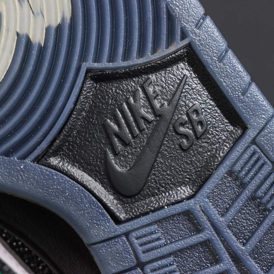 Close-up of Nike SB branding on translucent blue outsole of Bronx Girls Skate x Dunk Low SB ‘Mel & Kava’