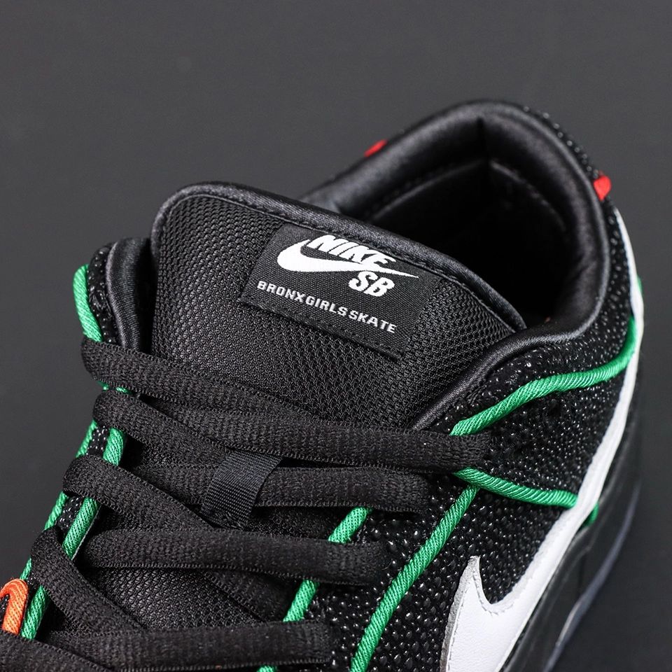 Bronx Girls Skate x Dunk Low SB ‘Mel & Kava’ front view showing black mesh tongue and green laces