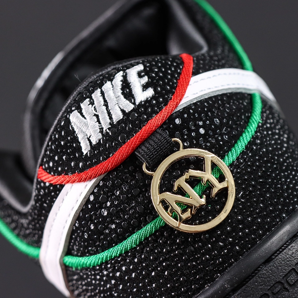 Bronx Girls Skate x Dunk Low SB ‘Mel & Kava’ heel close-up with embroidered Nike logo and gold NY charm