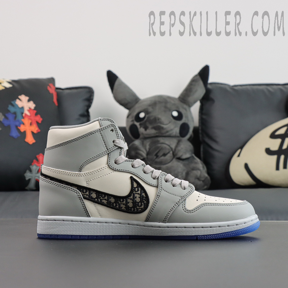 Side profile of Dior x Air Jordan 1 High emphasizing Dior monogram Swoosh logo.