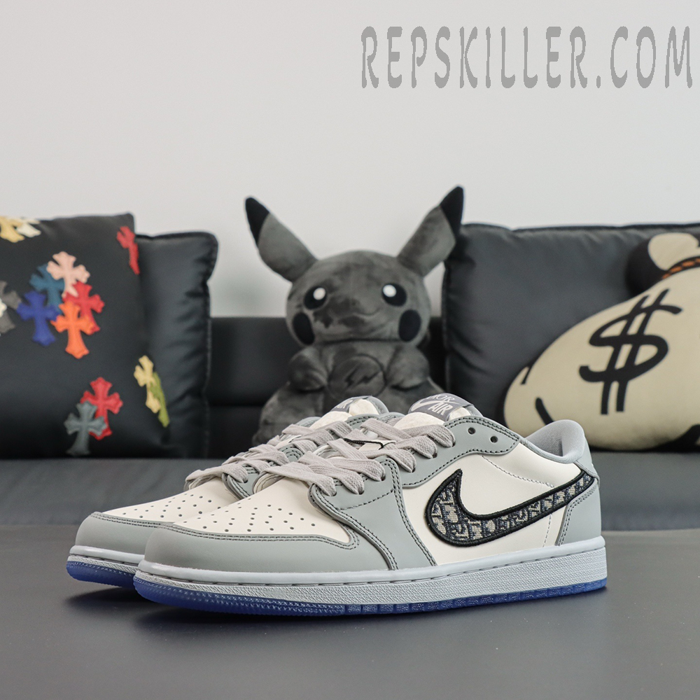 Dior x Air Jordan 1 Low side profile with classic grey leather overlays and Dior Oblique Swoosh