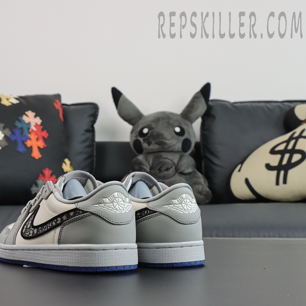 Dior x Air Jordan 1 Low rear view showing Air Dior Wings logo on heel tabs