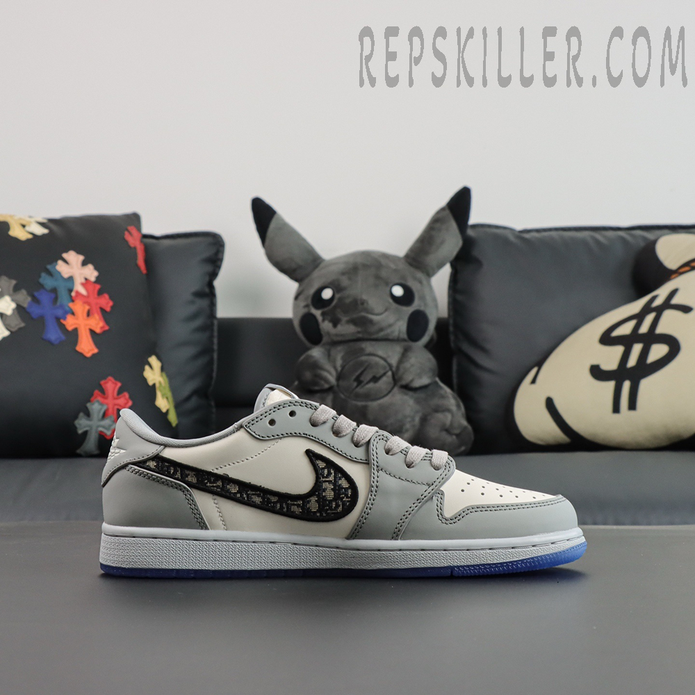 Dior x Air Jordan 1 Low medial side view displaying iconic Dior monogram Swoosh against cream leather base
