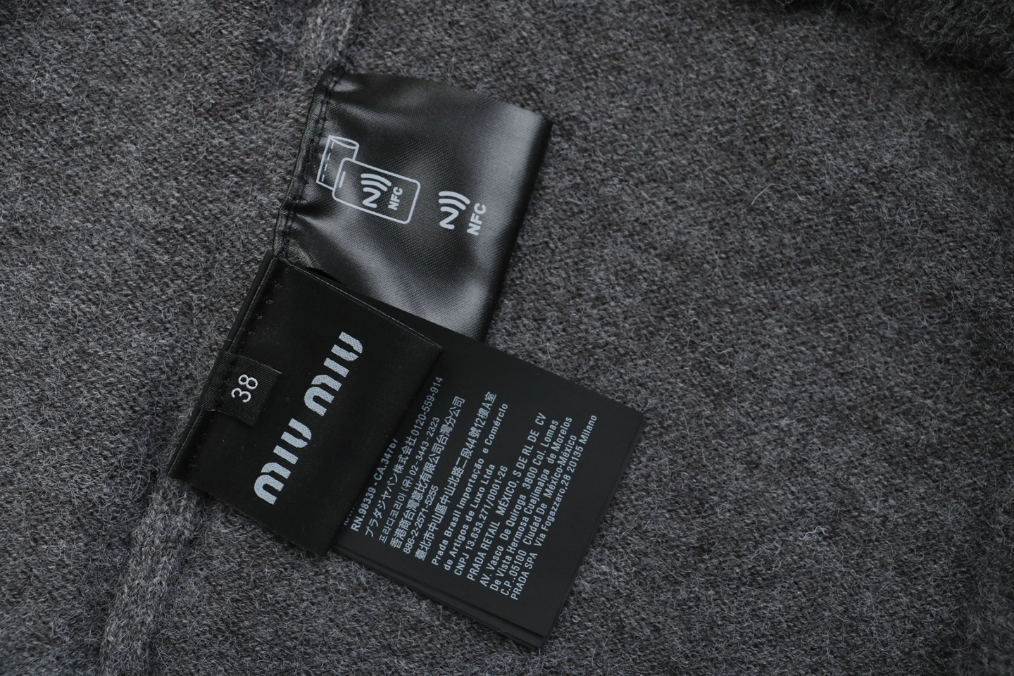 MM Layered-Look Wool Knit Sweater Logo tag