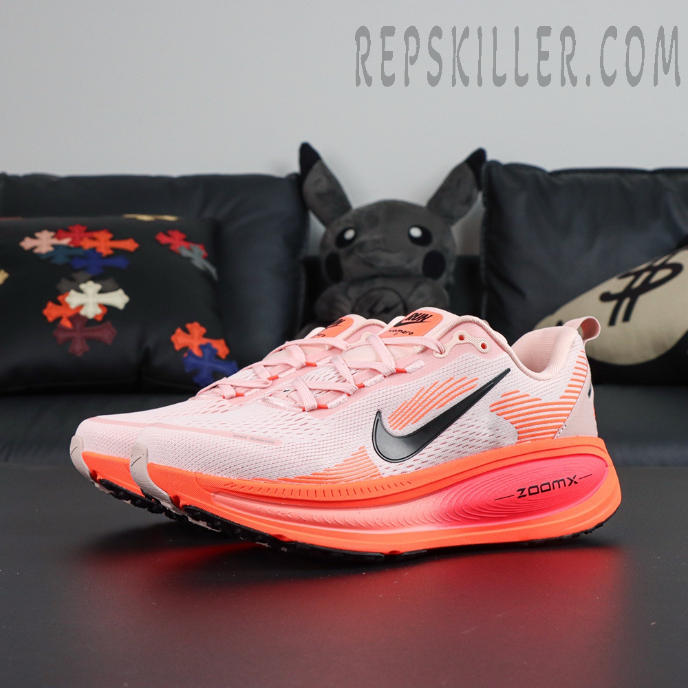 Nike Vomero 18 'Atmosphere Pink' front angle showing full profile and ZoomX cushioning