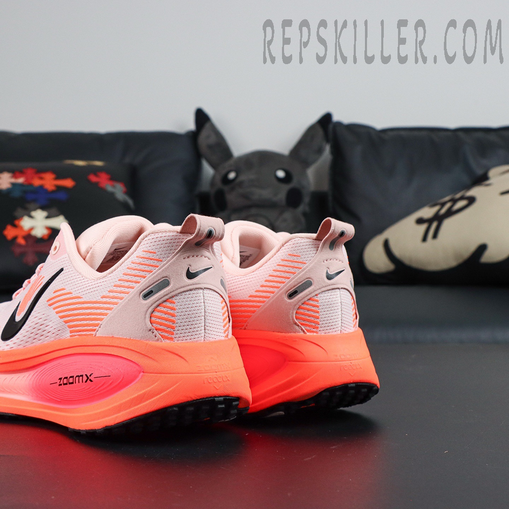 Nike Vomero 18 'Atmosphere Pink' rear angle showing heel support and ZoomX midsole