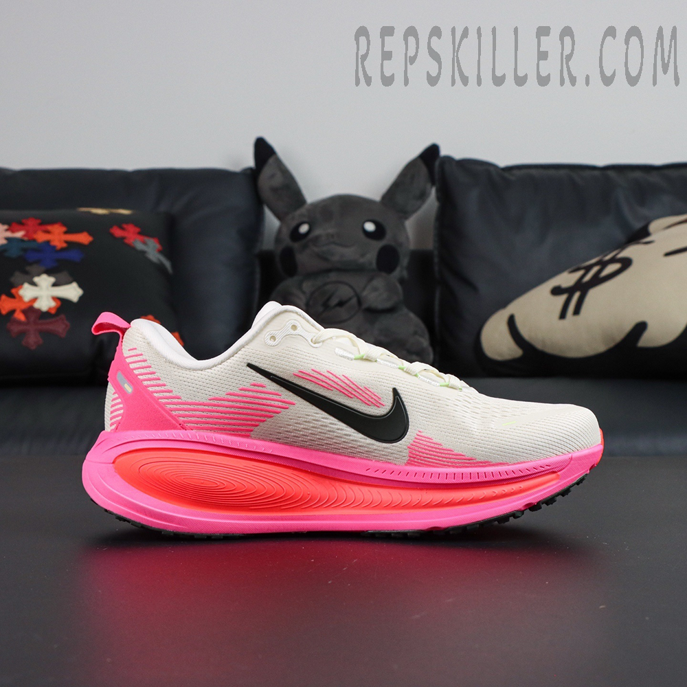 Nike Vomero 18 ‘Sail Hyper Pink’ front angle showing midsole gradient and Swoosh