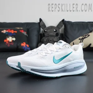 Nike Vomero 18 ‘Summit White Geode Teal’ alternate side profile highlighting engineered mesh and teal logo