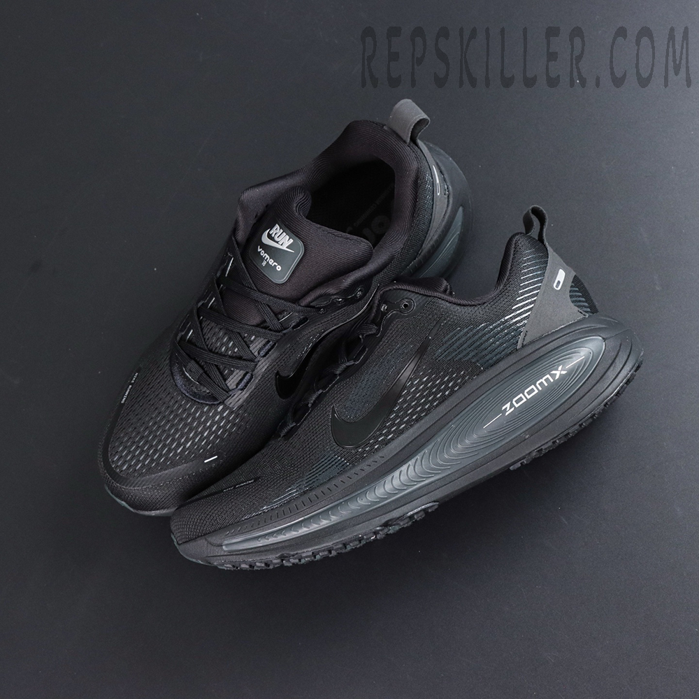 Nike Vomero 18 ‘Triple Black’ top-down layout revealing monochrome tongue, laces, and sleek silhouette