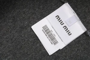 MM Color-Block Polo Collar Wool Sweater logo tag