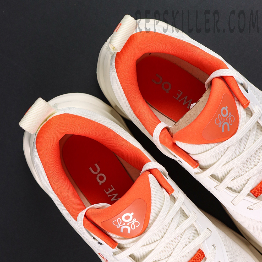 ON Loewe x Cloudtilt 2 ‘White Orange’ top view showing vibrant orange tongue and insole branding.