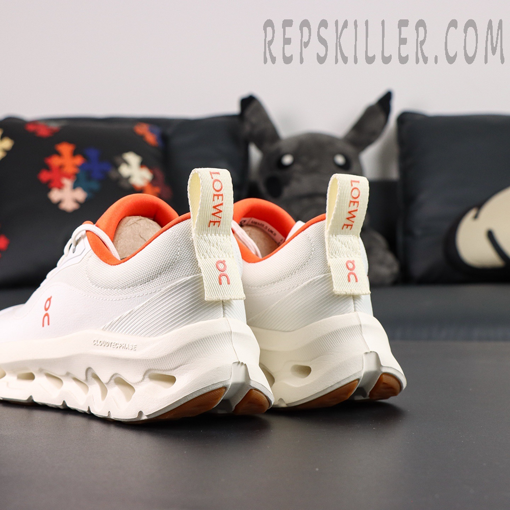 ON Loewe x Cloudtilt 2 ‘White Orange’ rear view highlighting LOEWE and On pull tabs with orange lining contrast.