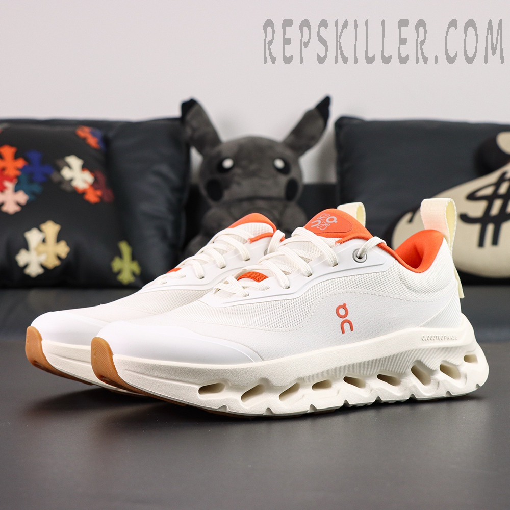 ON Loewe x Cloudtilt 2 ‘White Orange’ angled pair view highlighting layered mesh and orange detailing.