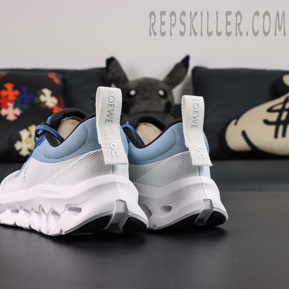 ON Loewe x Cloudtilt 2 ‘Blue White’ heel view highlighting dual-branded pull tabs with LOEWE and On logos.