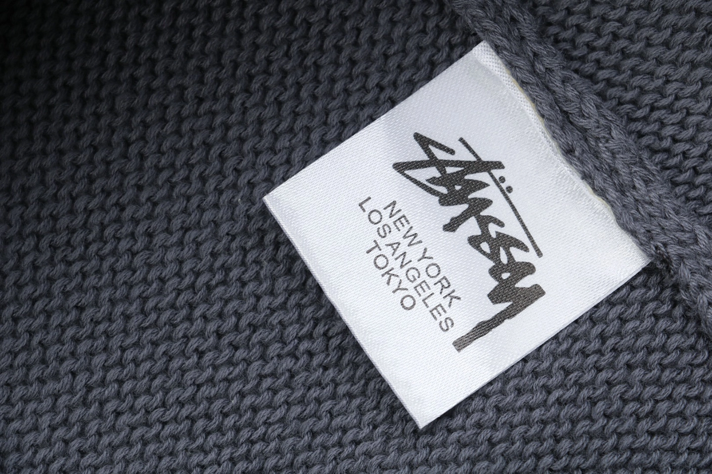 Stussy Surfer Graphic Knit Sweater Wash tag
