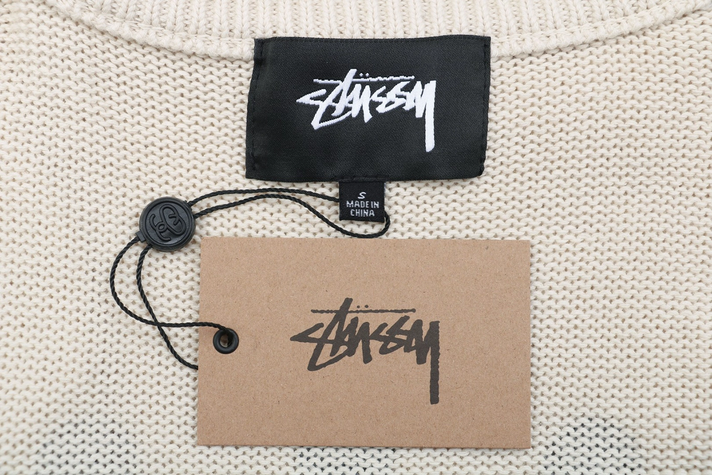 Stussy Surfer Graphic Knit Sweater Logo tag