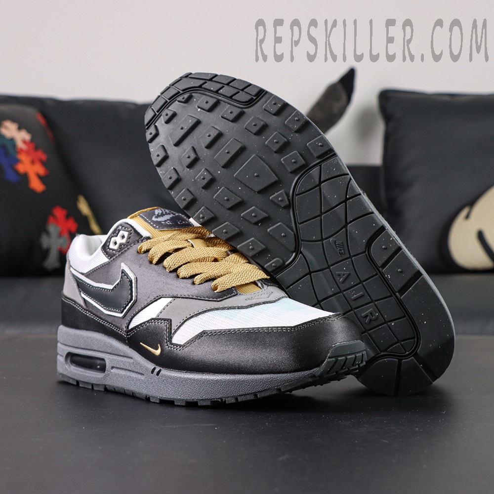 Sole view of Nike Air Max 1 “Low Poly - Big Head Mode” with black traction outsole and signature Air Max cushioning.