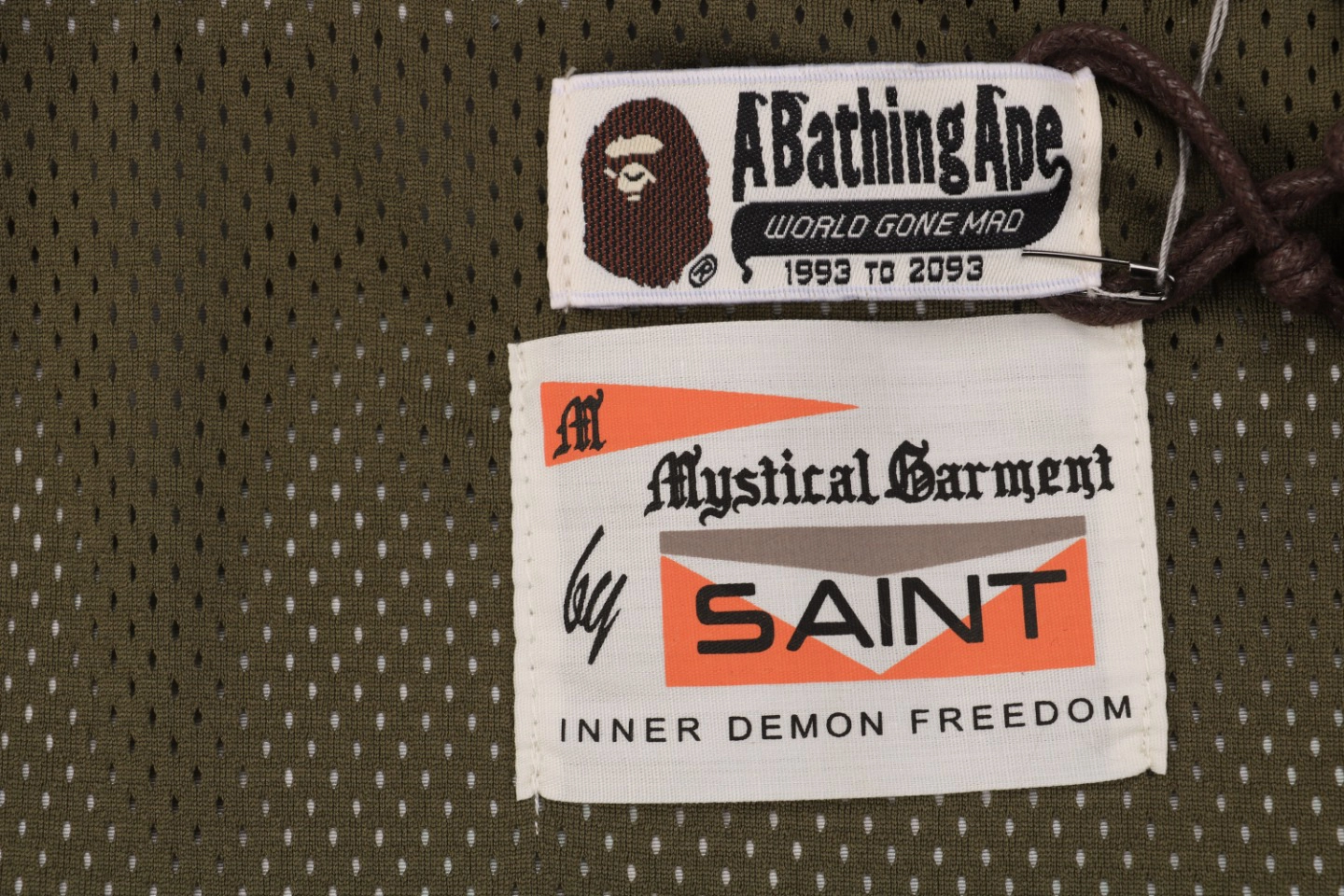 Bape × Saint Michael Co-Branded Tape Camo Jacket Brand label