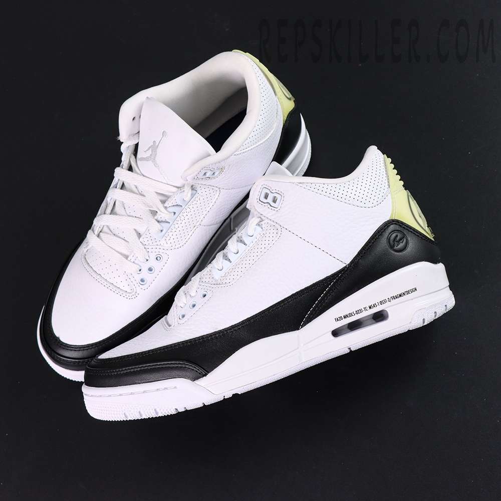 Overhead pair view of Fragment x Air Jordan 3 “White” showing minimal design and text print on midsole.