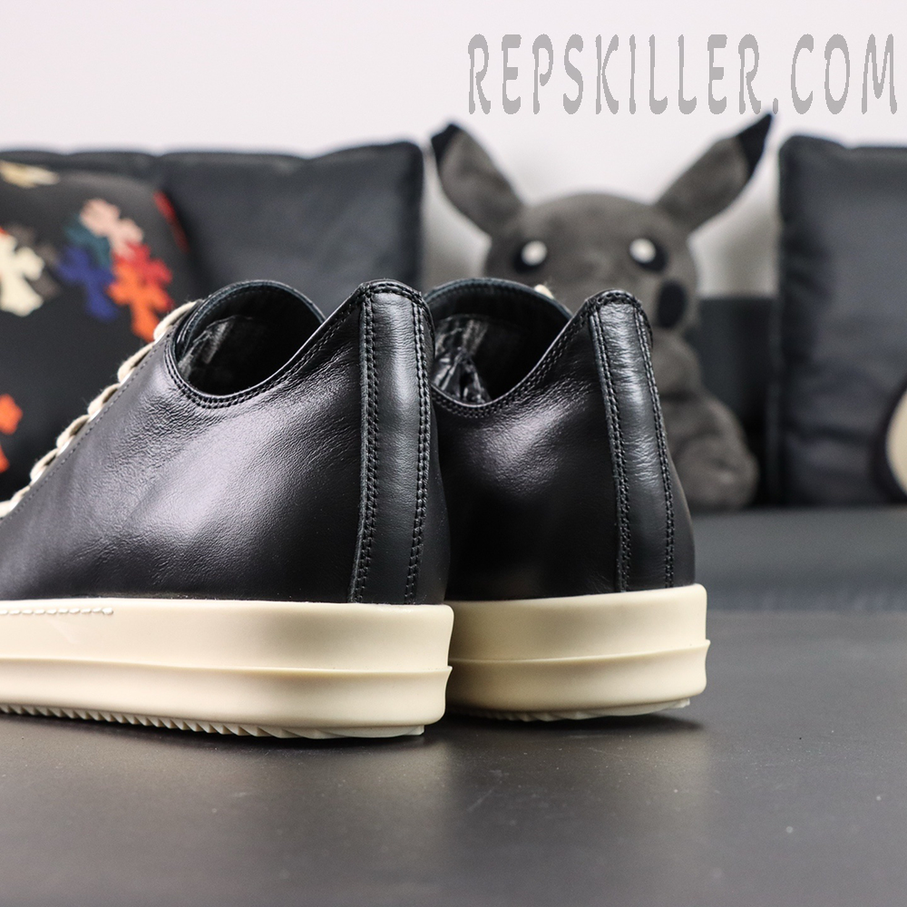 Rear angled view of Hollywood Low “Black Milk” showing smooth leather heel and layered midsole.