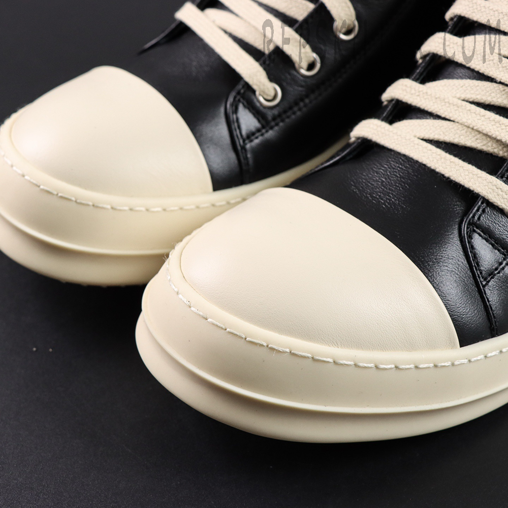 Close-up of Hollywood Low “Black Milk” toe cap highlighting cream rubber material and fine stitching.