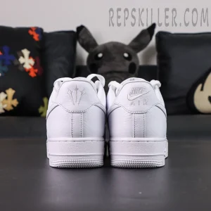 Rear view of NOCTA x Nike Air Force 1 “Certified Lover Boy” showing Nike Air and trident logos on heel tabs.