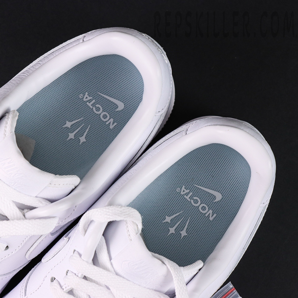 Top view of NOCTA x Air Force 1 “Certified Lover Boy” showing blue insoles with NOCTA branding.
