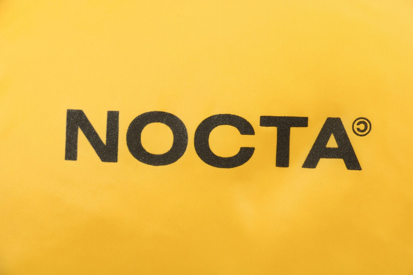 Nike x Drake NOCTA Stand Collar Down Jacket Yellow Back Print