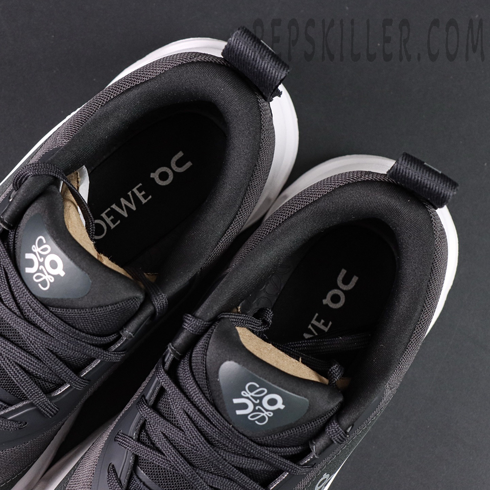 Overhead close-up of ON L × Cloudtilt 2 “Black” showing padded collar and LOEWE × On insole branding.