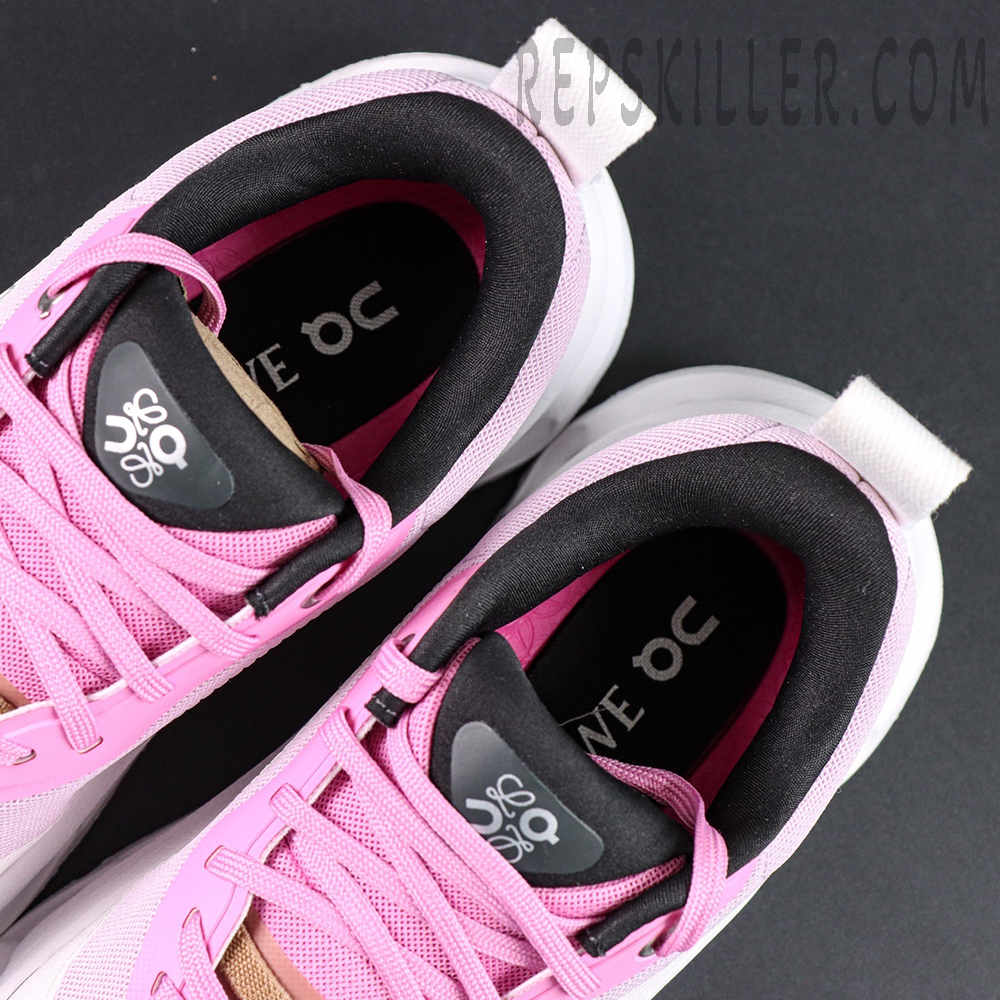 Overhead view of ON L × Cloudtilt 2 “Pink White” highlighting padded collar and co-branded insoles.