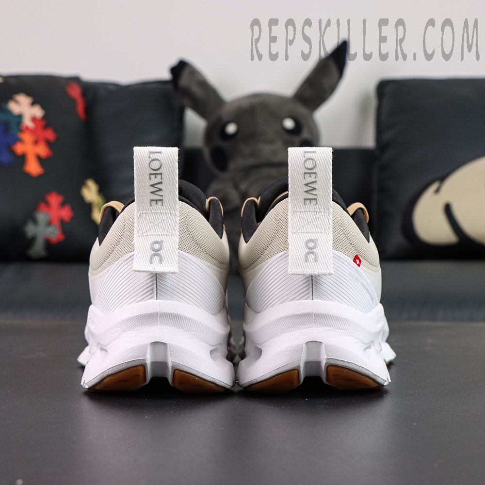 Back view of ON L × Cloudtilt 2 “Tan White” showing symmetrical heel tabs with LOEWE branding.