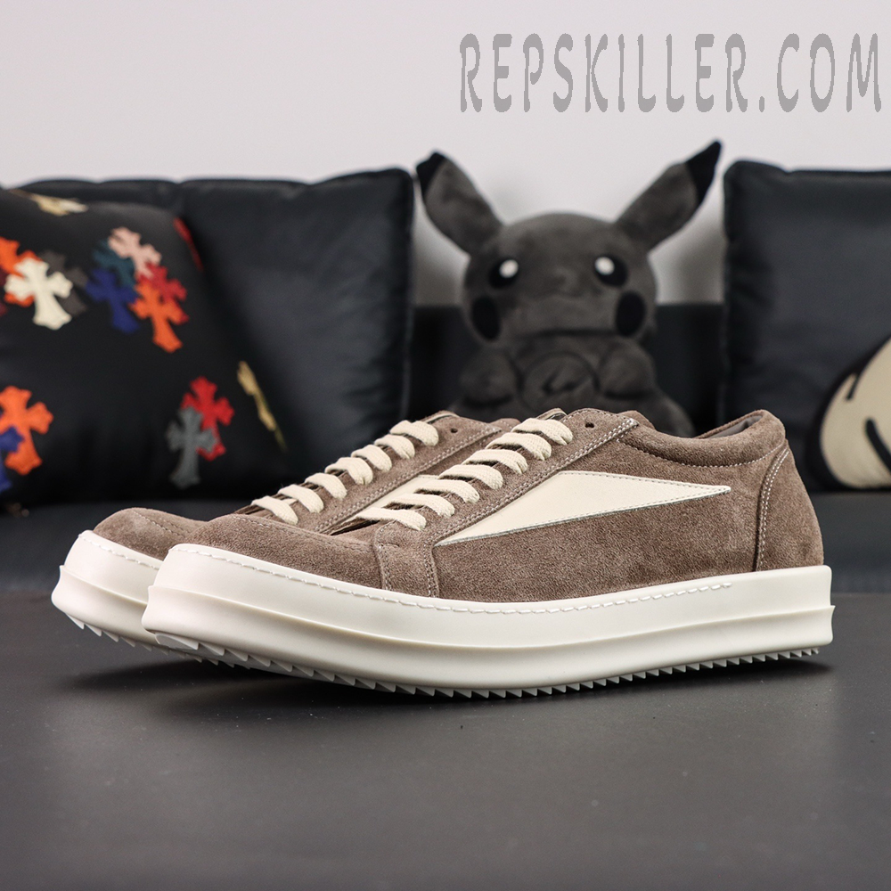 Angled front view of DRKSHDW Porterville Vintage Low “Dust Milk” showing contrast between taupe and cream tones.
