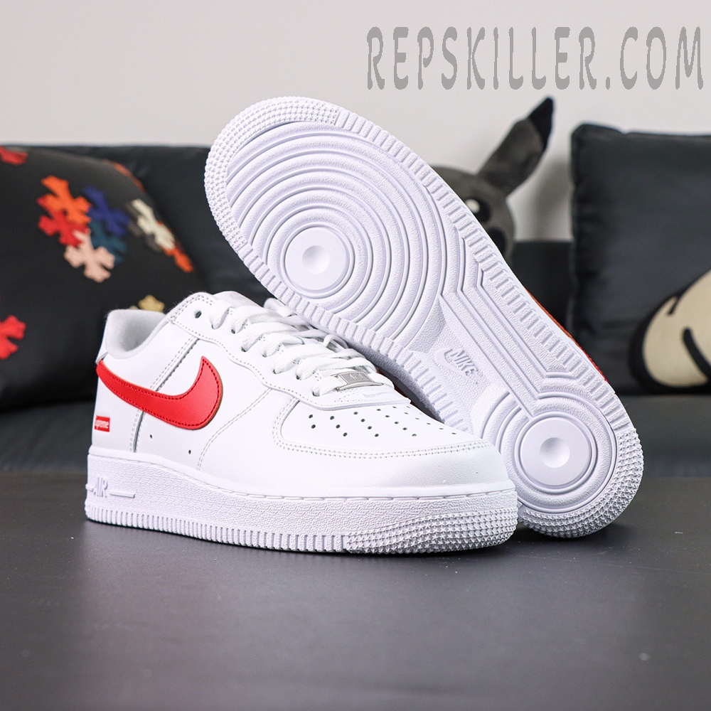 Bottom view of Supreme x Nike Air Force 1 Low SP ‘Box Logo - Speed Red’ showing outsole traction pattern and logo detail