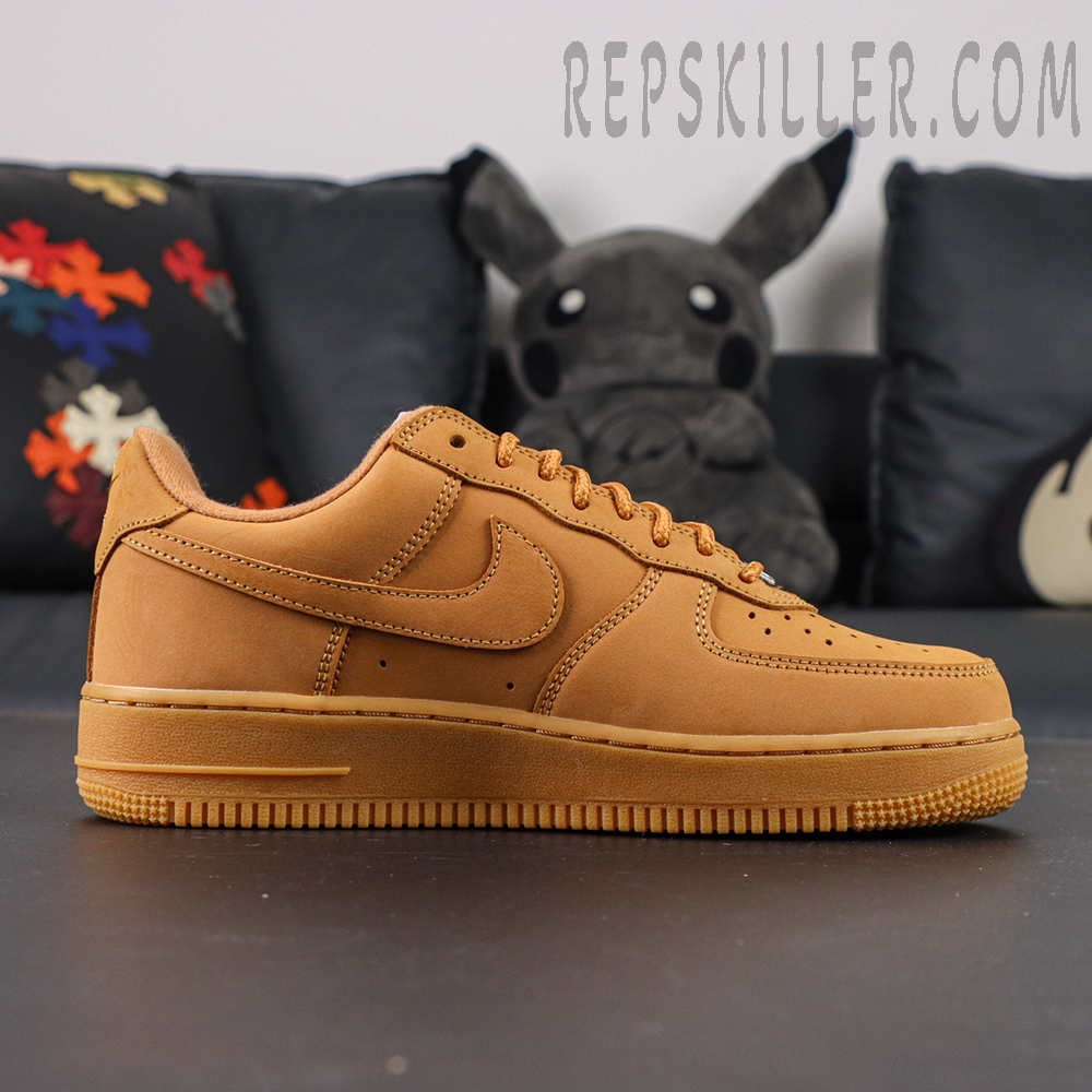 Side profile of Sup x Air Force 1 Low SP ‘Box Logo - Wheat’ featuring wheat leather upper and tonal swoosh