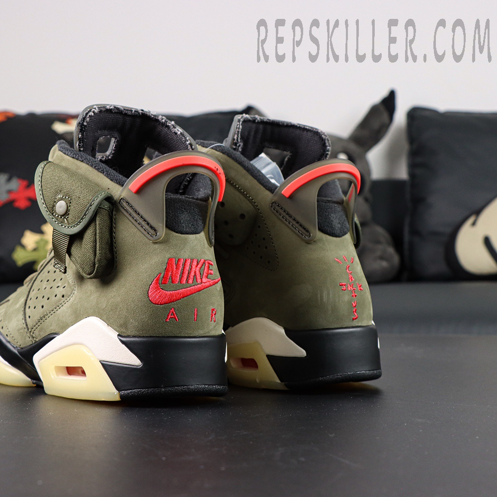 Rear angle of Travis Scott x Air Jordan 6 “Olive” highlighting Nike Air and Cactus Jack embroidery.