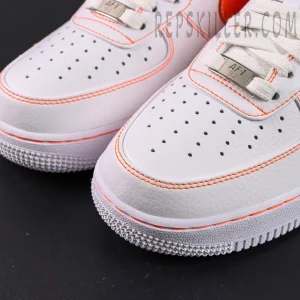 Toe box close-up of Vlone x NikeLab Air Force 1 ‘White’ showing perforated leather and orange stitching