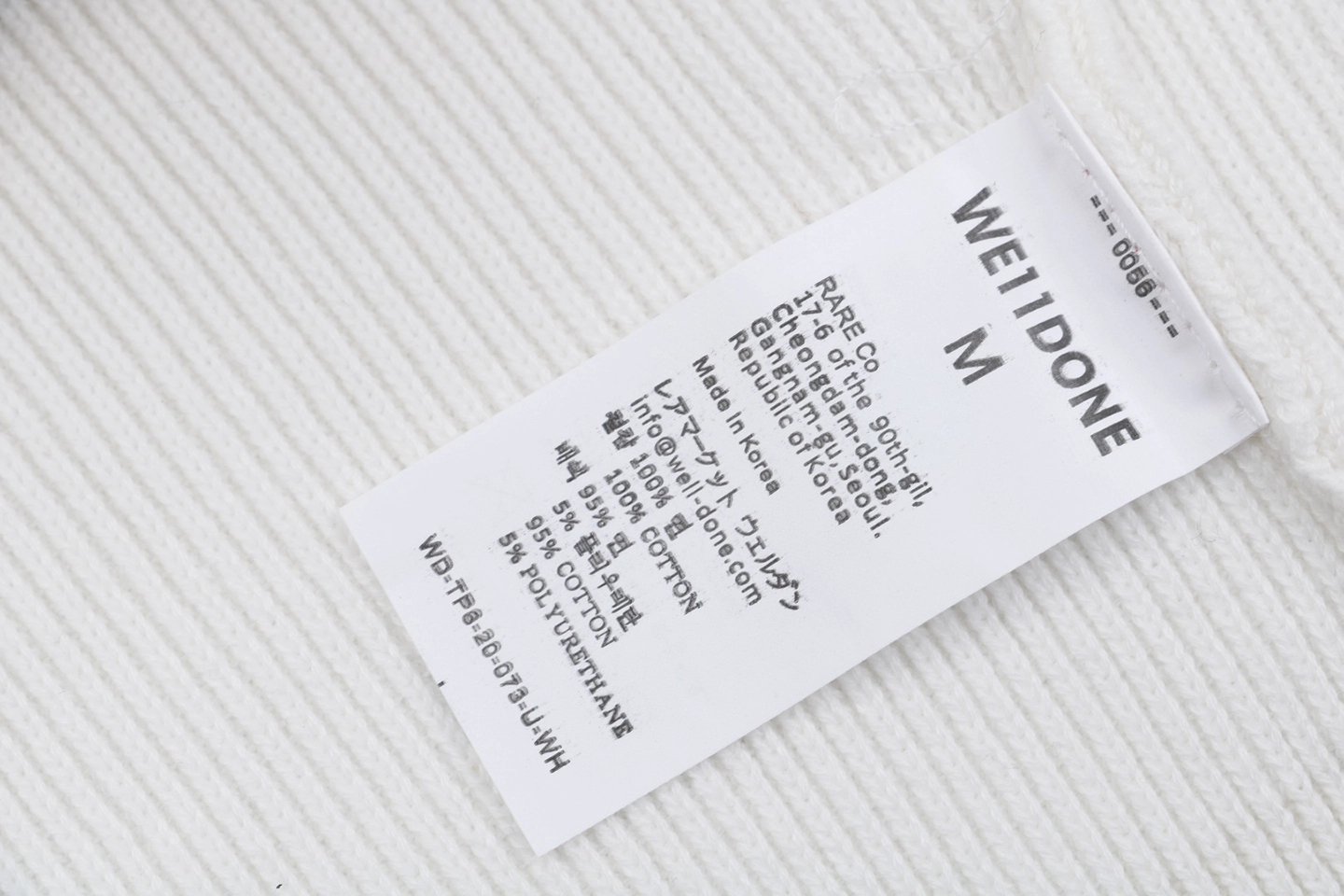 We11done Small WE Logo High-Neck Knit Sweater White Wash label