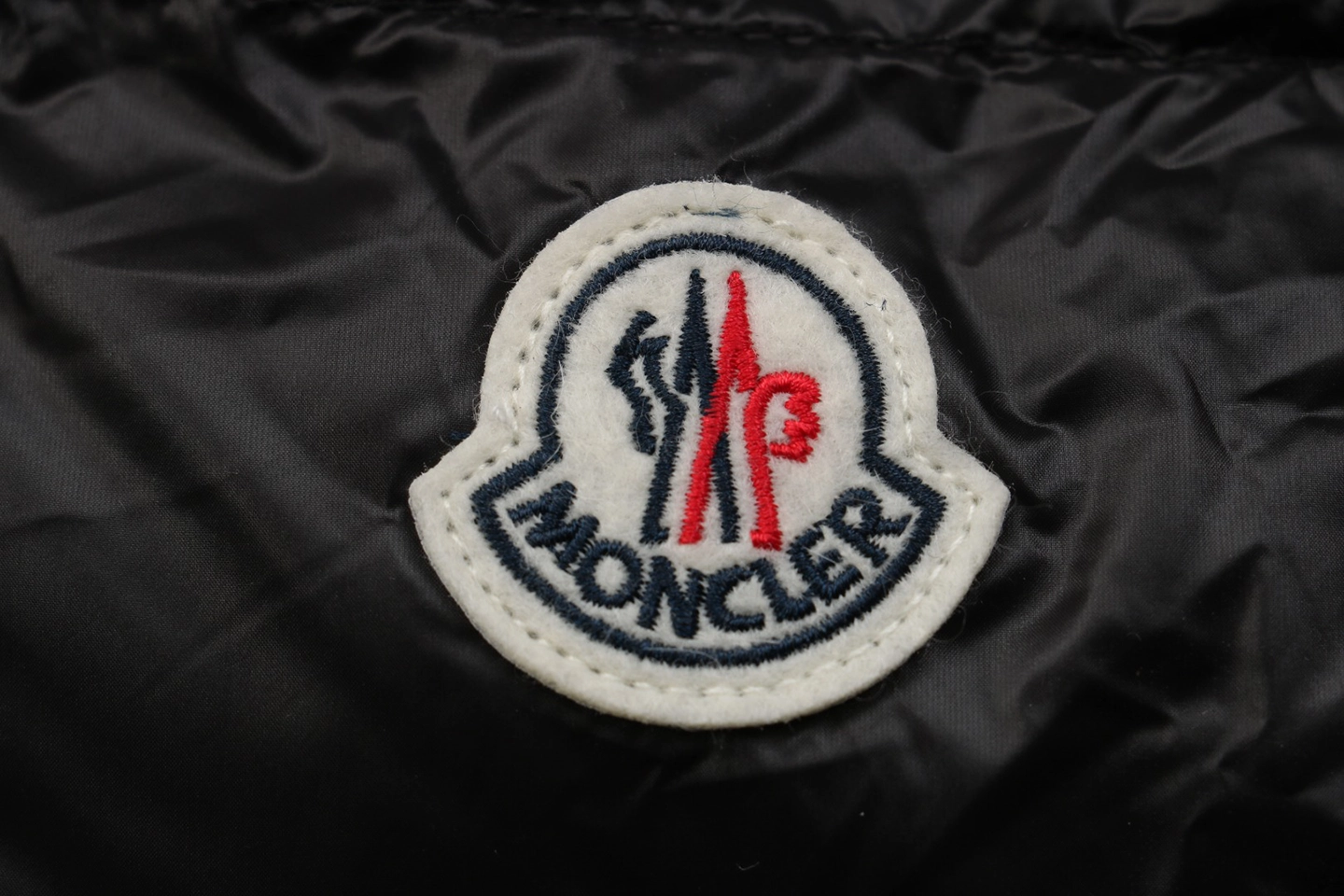 Mxxcler Moka Hooded Down Jacket Brand label