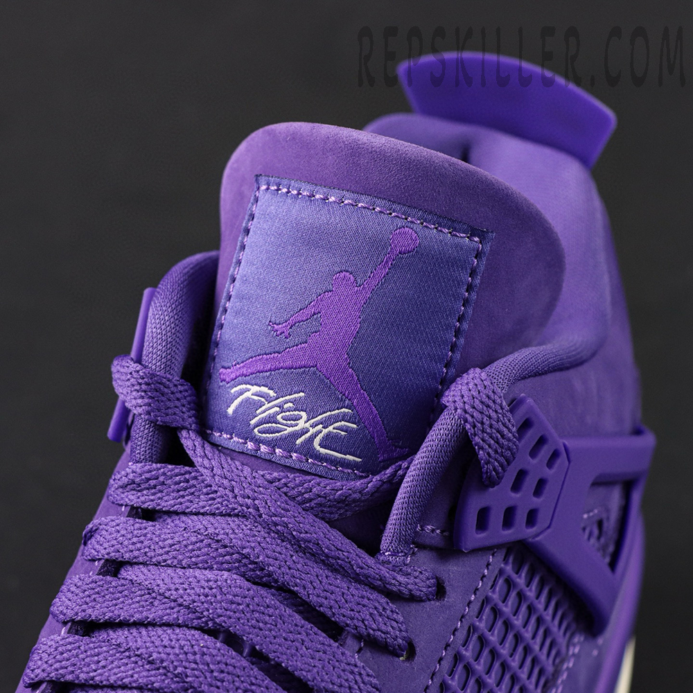 Detailed view of the tongue patch on the Nigel Sylvester Jordan 4 Purple showing the Jumpman logo and ‘Flight’ text embroidery.