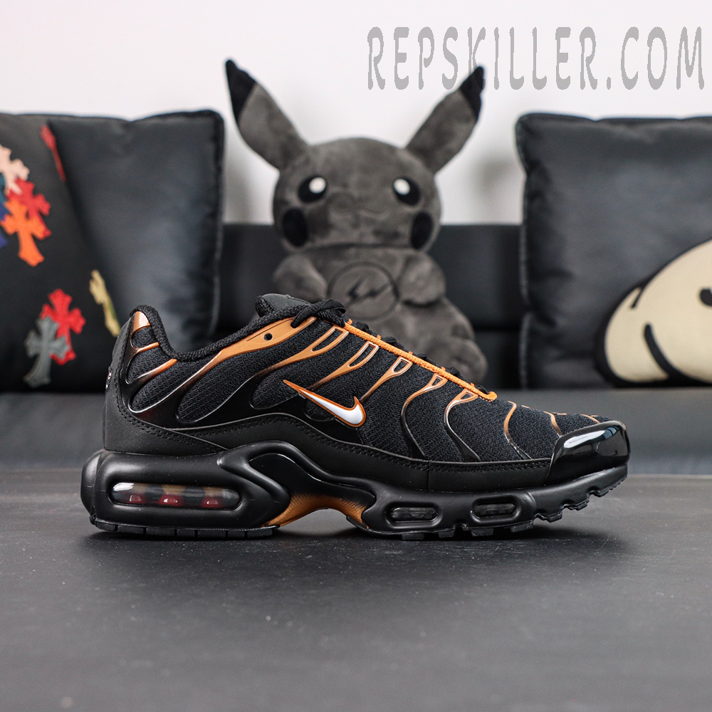 Nike Air Max Plus Dark Obsidian Monarch side view with orange Nike Swoosh