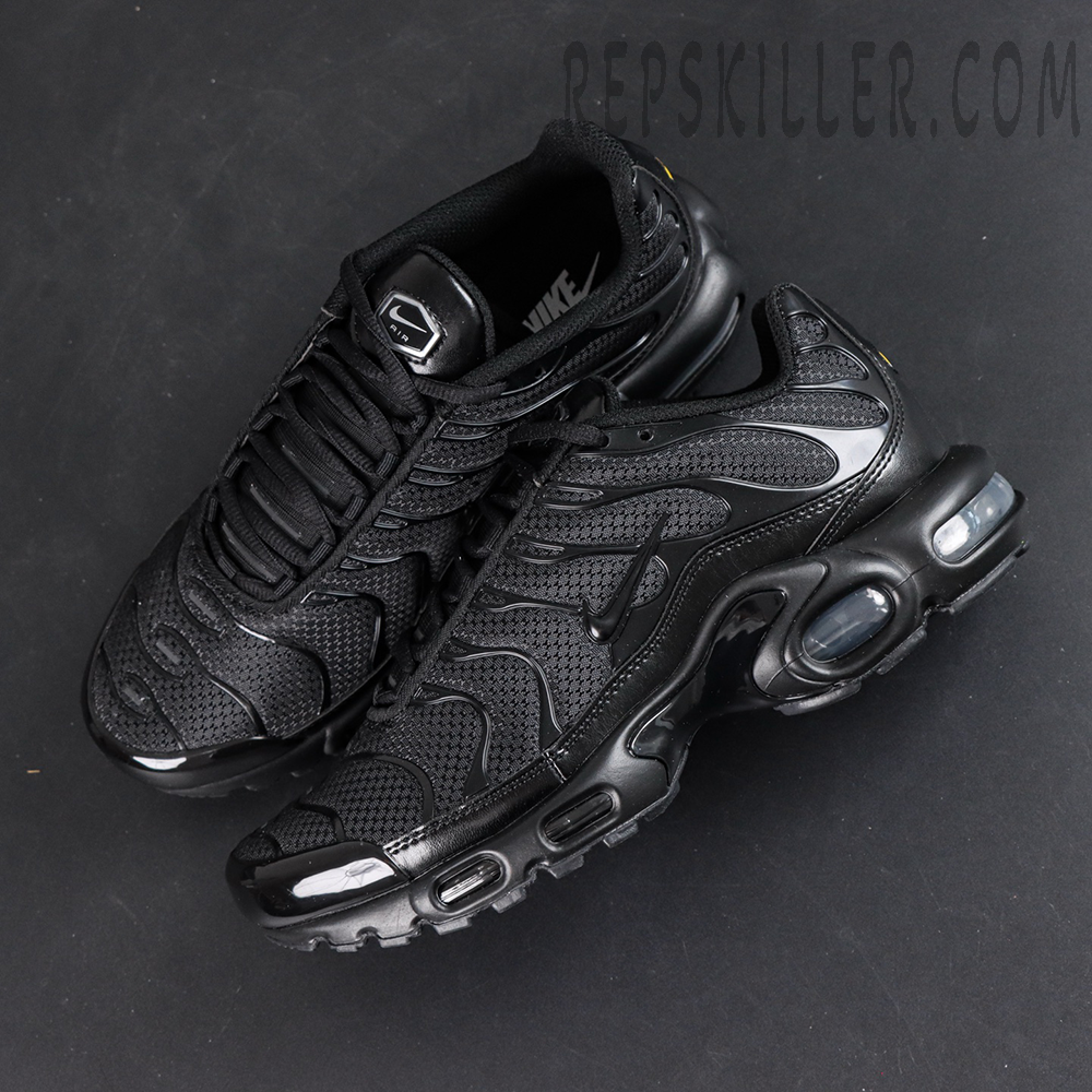 Nike Air Max Plus Triple Black sneakers angled top-down view