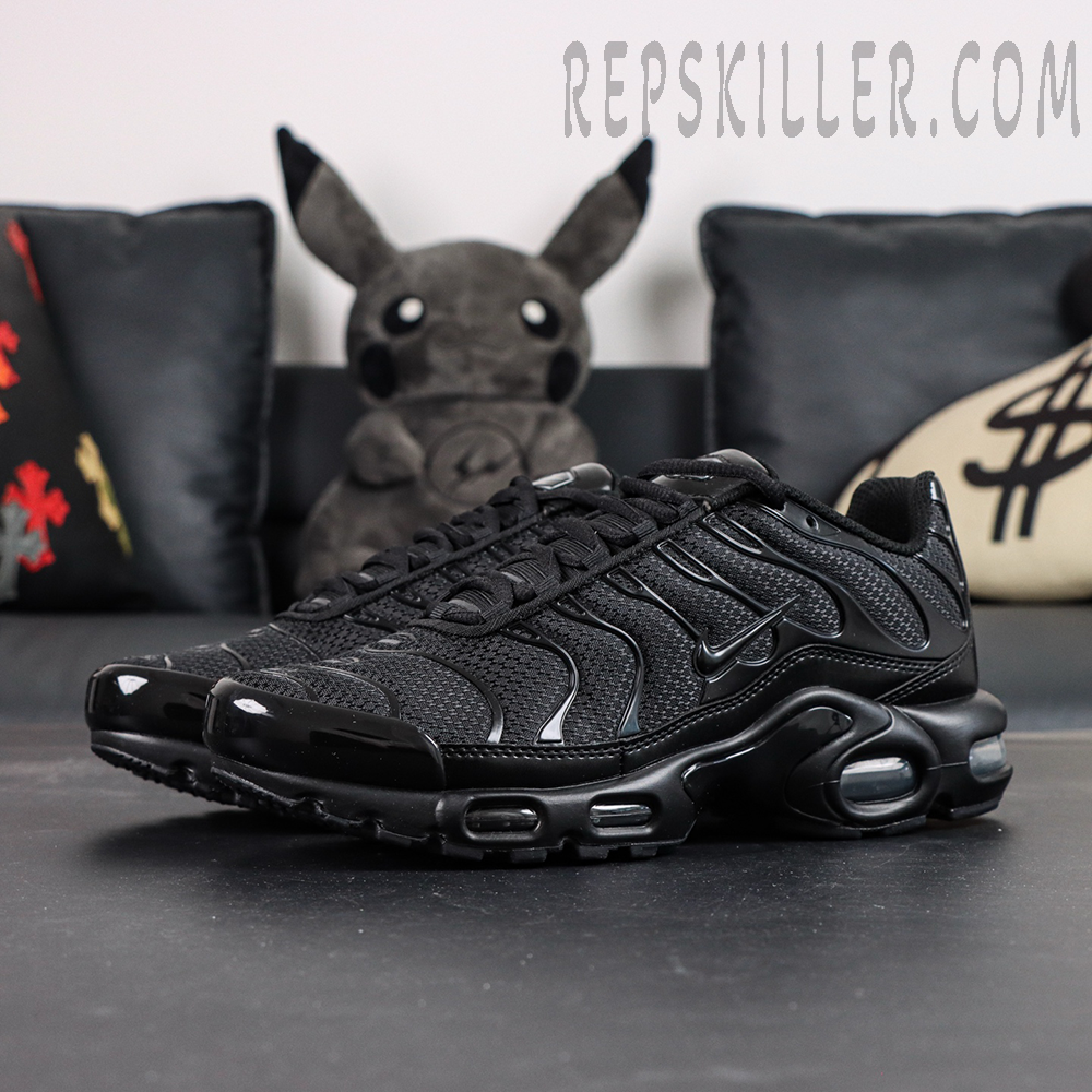 Nike Air Max Plus Triple Black sneakers front angled view