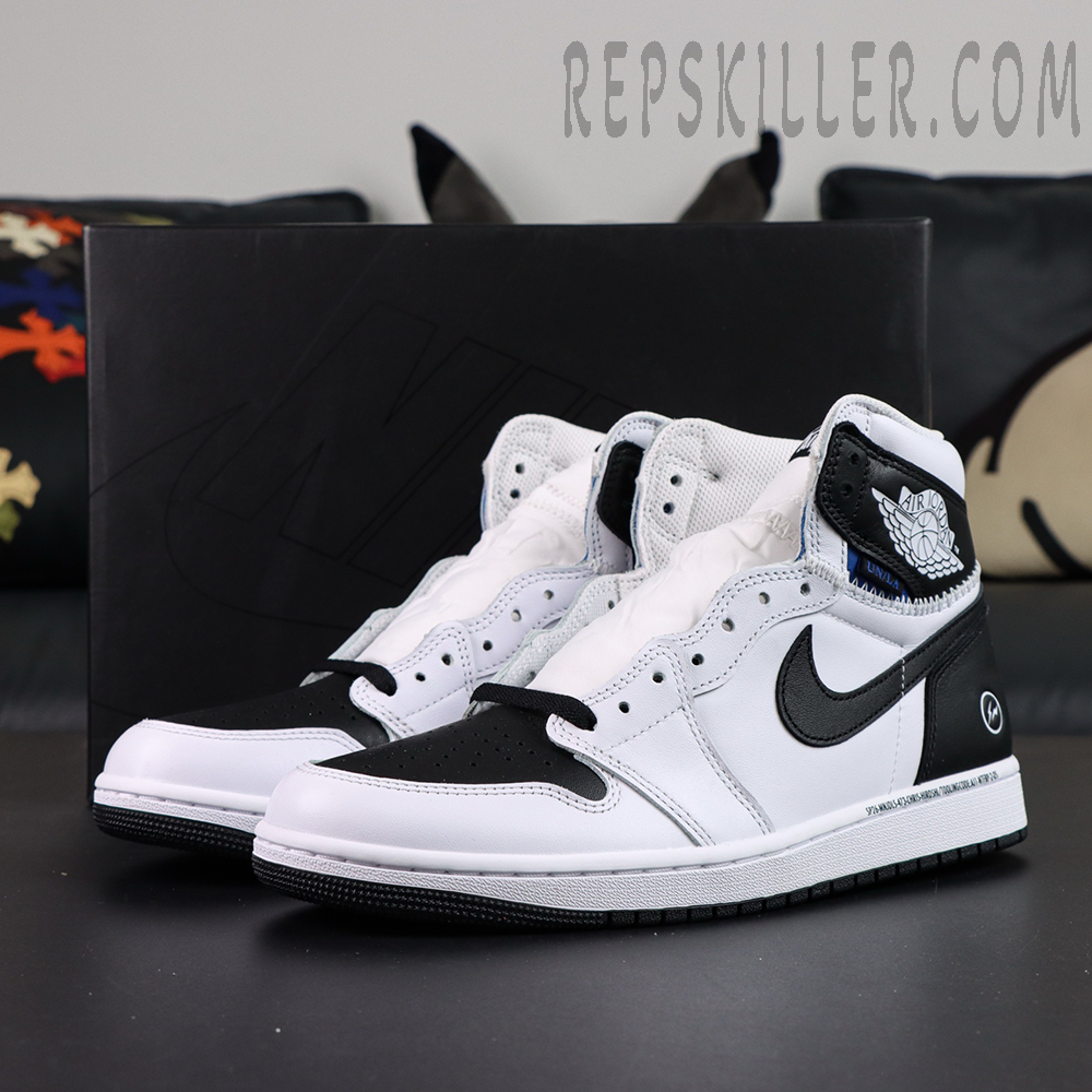 Fragment Design x Union LA x Air Jordan 1 “White Black” collaboration sneakers, pair displayed at front-side angle showing overall silhouette and color balance