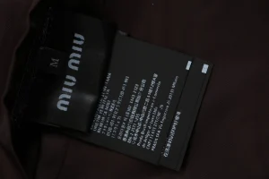 Miu Miu Logo Half-Zip Wool Blend Jacket Wash label